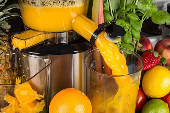 Fruit juicer machine