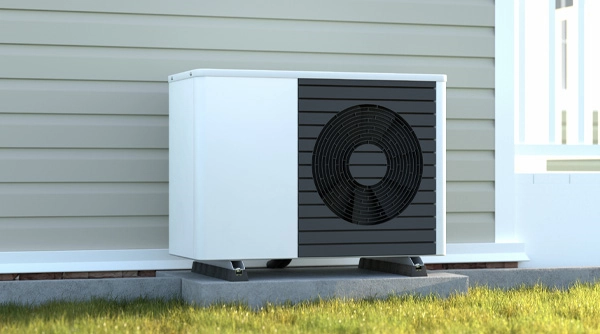 Air-to-air heat pump outdoor unit in garden